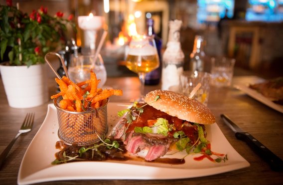 HEAT Steakhouse & Burgerschmiede in Rostock - Logo